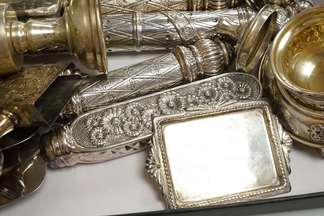 A small group of assorted continental 925 and other white metal items including a Judaic scroll holder, a Torah pointer?(lacking pointer), an Israeli ashtray, three Judaic match sleeves, two 925 handled servers and an Ir